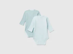 Two long sleeve ribbed bodysuits