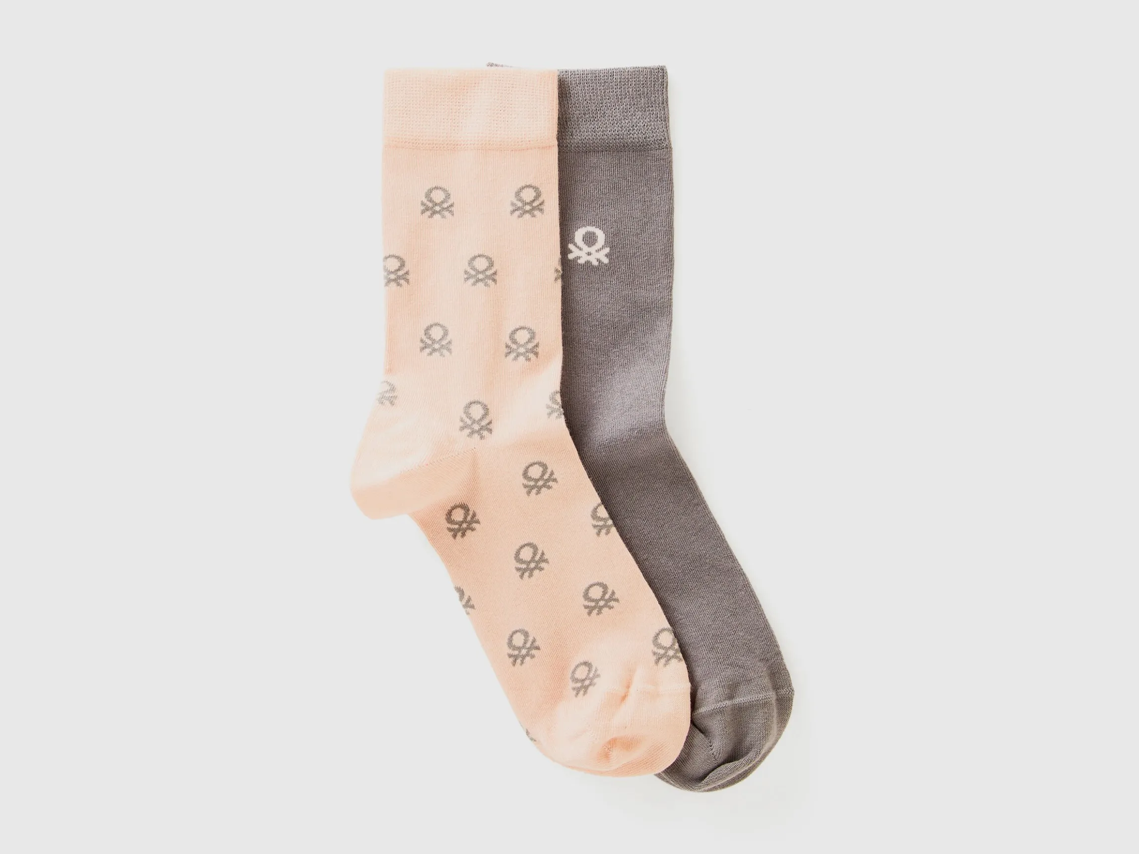 Two pairs of long socks with logos