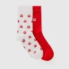 Two pairs of long socks with logos