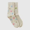 Two pairs of long socks with logos