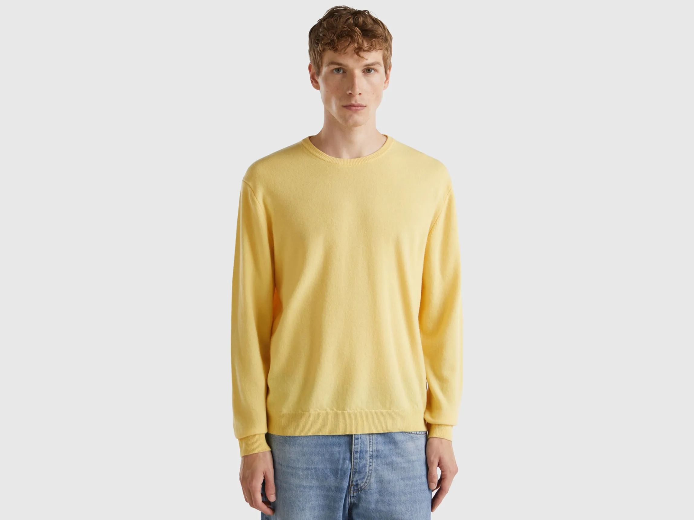 Yellow crew neck sweater in pure Merino wool