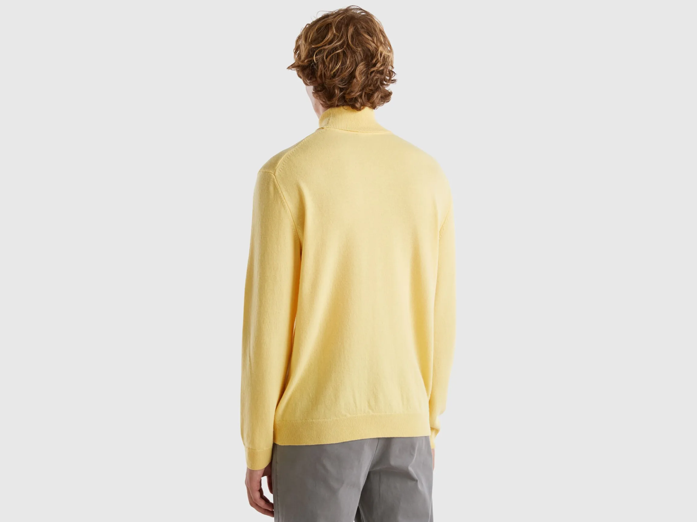 Yellow turtleneck in pure Merino wool