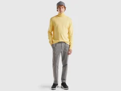 Yellow turtleneck in pure Merino wool