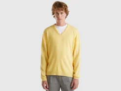 Yellow V-neck sweater in pure Merino wool
