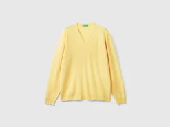 Yellow V-neck sweater in pure Merino wool